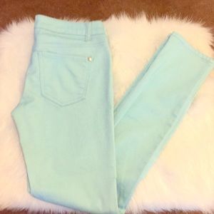 Pastel blue pants.